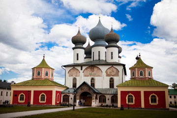Fototapeta na wymiar Russian Orthodox Church, a temple on a background of blue sky and clouds.