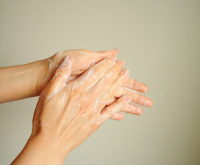 Fototapeta premium washing hands with soap