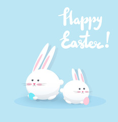 Obraz na płótnie Canvas White cute rabbits with eggs
