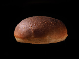 American bun on black background