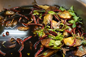 Sweet and salty fresh mackerel stew at Amphawa Floating Market, Thai street food