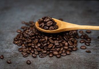 Coffee beans with wooden spoon