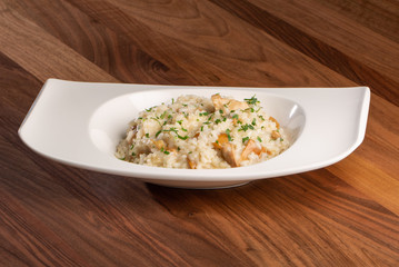 details of tasty creamy risotto mushrooms