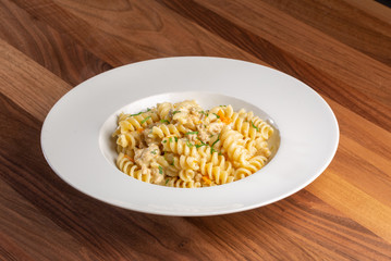 details of tasty italian pasta with chicken and cream