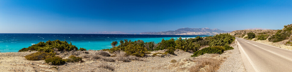 road view of the beach and sea Panoramic view of sea bay and town of Rhodes. 