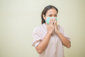 Women concerned about the Covid-19 virus And her mask