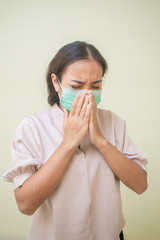 Women concerned about the Covid-19 virus And her mask