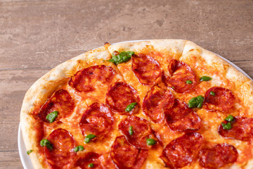 details of tasty fresh baked pesto spicy pizza
