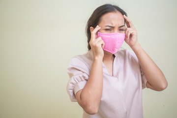 Women concerned about the Covid-19 virus And her mask