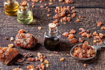 A bottle of myrrh essential oil and myrrh resin