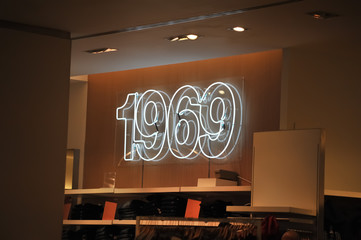 Big numbers neon inscription. Neon wall inscription 1969.