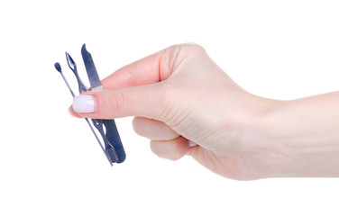 manicure set in hand on white background isolation