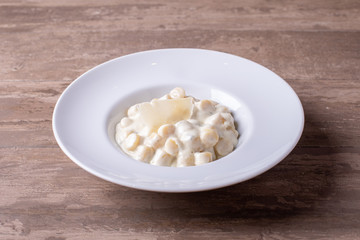 details of fresh hot gnocchi with 4 cheese cream