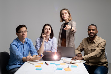 Team leader pointing at camera while inviting you to become part of startup team, group of...