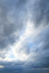 Stormy sky with storm clouns on the sunset with beautiful sun