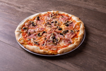 details of tasty ham and mushrooms pizza