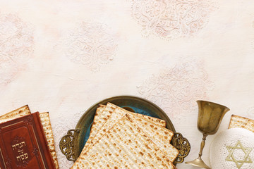 Pesah celebration concept (jewish Passover holiday). Traditional book with text in hebrew: Passover Haggadah (Passover Tale)