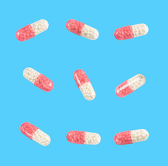 medical capsules on a clear blue background