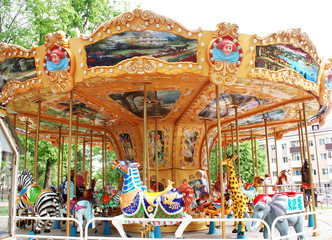 Children's carousel in an amusement park, an amusement park.
