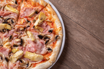 details of fresh baked tasty italian capriciosa pizza