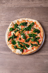 details of fresh tasty spinach pizza