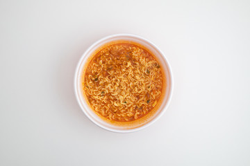 Instant cup noodles with spicy soup.