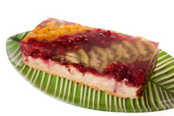 cheesecake with berries isolated on white