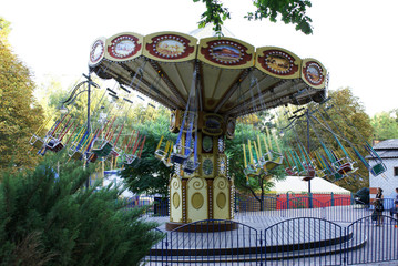 Children's carousel in an amusement park, an amusement park.