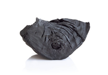 Obraz premium Natural black charcoal isolated on white background