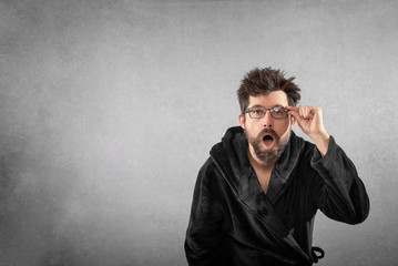 Man in bathrobe with funny hair funny face isolated background - obrazy, fototapety, plakaty