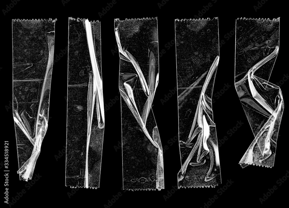 Wall mural set of transparent adhesive tape or strips isolated on black background, crumpled plastic sticky snips, poster design overlays or elements.