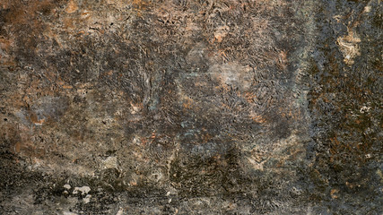 Moldy shabby concrete pavement.Ancient wall with peeling plaster. Old concrete wall textured background