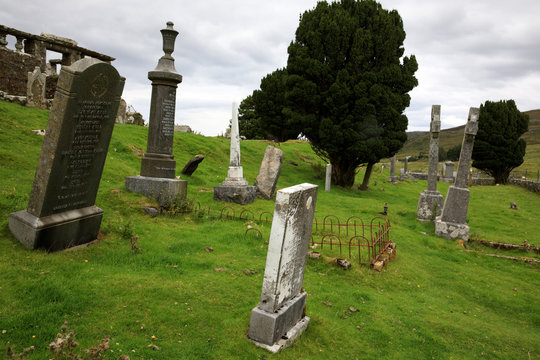 Cill Chriosd - Skye Island (Scotland), UK - August 13, 2018: Gravestones in the graveyard of Cill Chriosd / Kilchrist Church on the Isle of Skye, Inner Hebrides, Scotland, United Kingdom