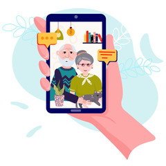 Video calling with old couple. Parents stay home and talking with friends or kids. Video conference with grandparents. Retired parents have dialog with grandkids. Family chat using cellphone.