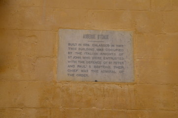 Inscription at the Auberge de Castille, originally built in 1574 for the Knights of the Order of St John, serves today as the offices of the Prime Minister of Malta.