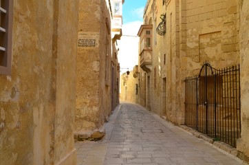 Beautiful view of ancient narrow medieval street town Mdina, Malta
