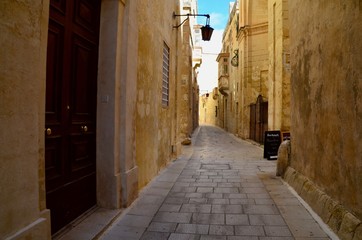 Beautiful view of ancient narrow medieval street town Mdina, Malta