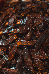 Red fried grasshoppers with chili peppers in Mexico