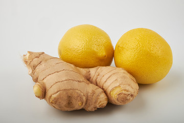 Ginger bio and lemon on white background.
