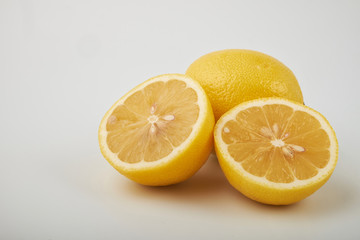 Ginger bio and lemon on white background.