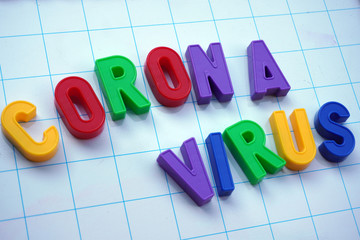 Europe, Asia and America ( USA )  close schools and universities due to n-cov19 epidemic - child writes on magnetic board with letters 