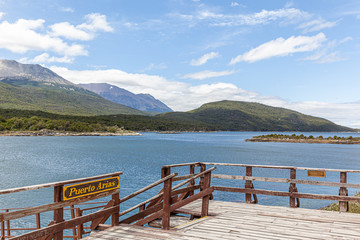 Deck and sign of Puerto Arias (Arias Port) - Tierra del Fuego National Park - Ushuaia, Argentina - obrazy, fototapety, plakaty