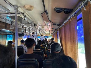 Bangkok, Dusit / Thailand - March 12, 2020: The way of life of the crowd traveling by bus number...