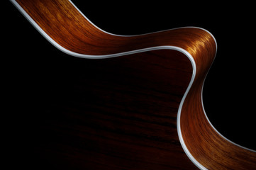 Contour of an acoustic guitar with cutaway, detail
