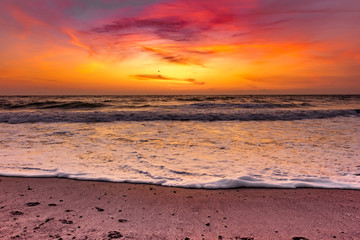 Beautiful view of the sea in the morning sunrise with waves washing the shore, Vama Veche, Black Sea, Romania