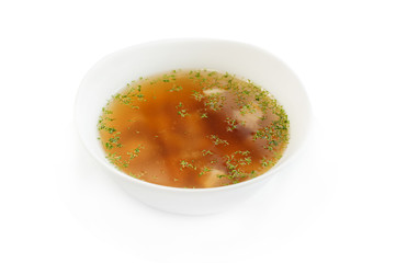 Fresh fish soup on the white background
