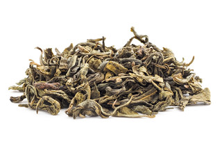 A handful of baikhovi green tea on white background isolate. Dried tea leaves, close-up. The concept of tea drinking and cleansing the body. Ingredients for detox and herbal medicine