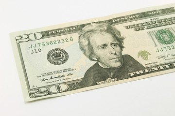Twenty dollar bills in cash on white background