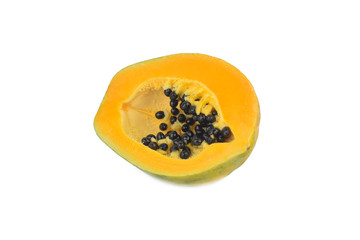 Side view of a half fresh green medium sized papaya fruit isolated on a white background