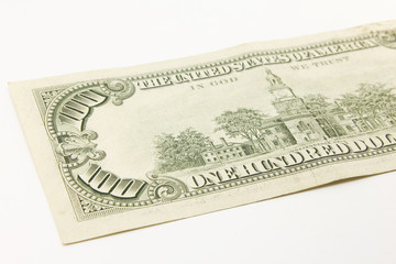 One hundred dollar cash banknotes on white background